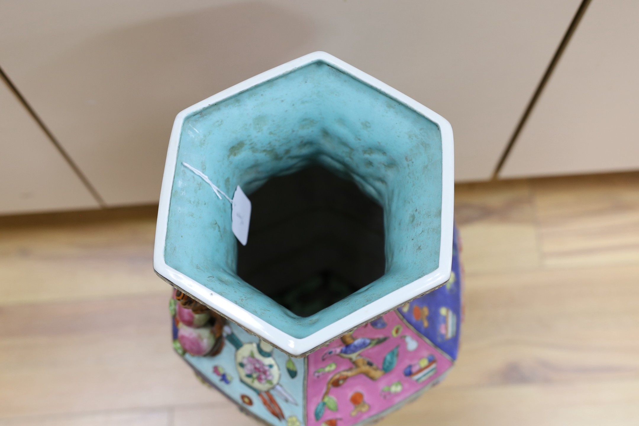 A large Chinese famille rose two handled hexagonal vase. 64cm tall